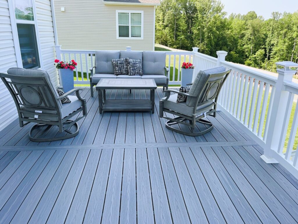Patio chairs on a gray composite deck