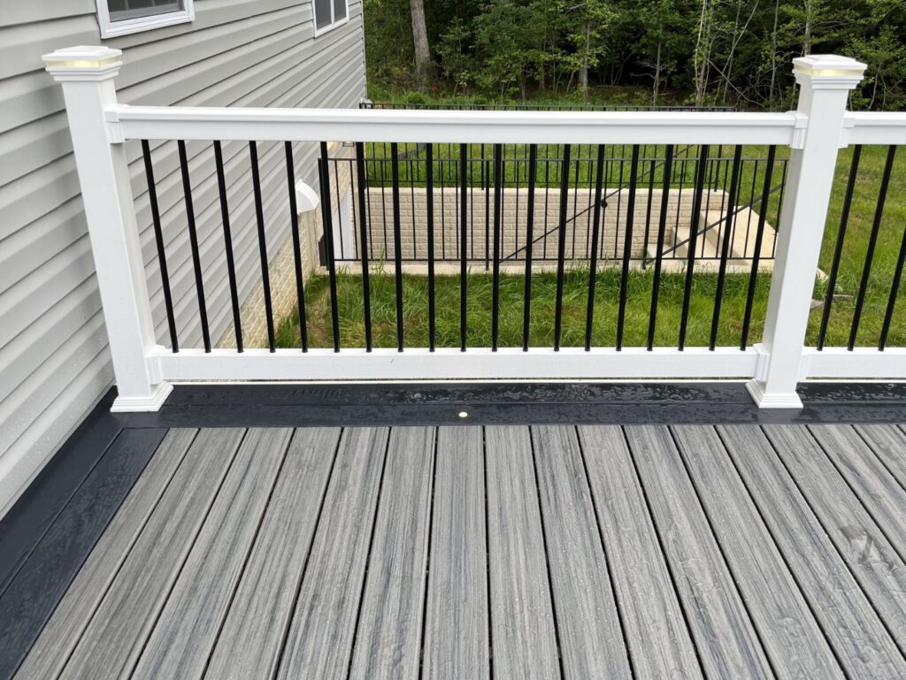 Gray composite deck with black balusters