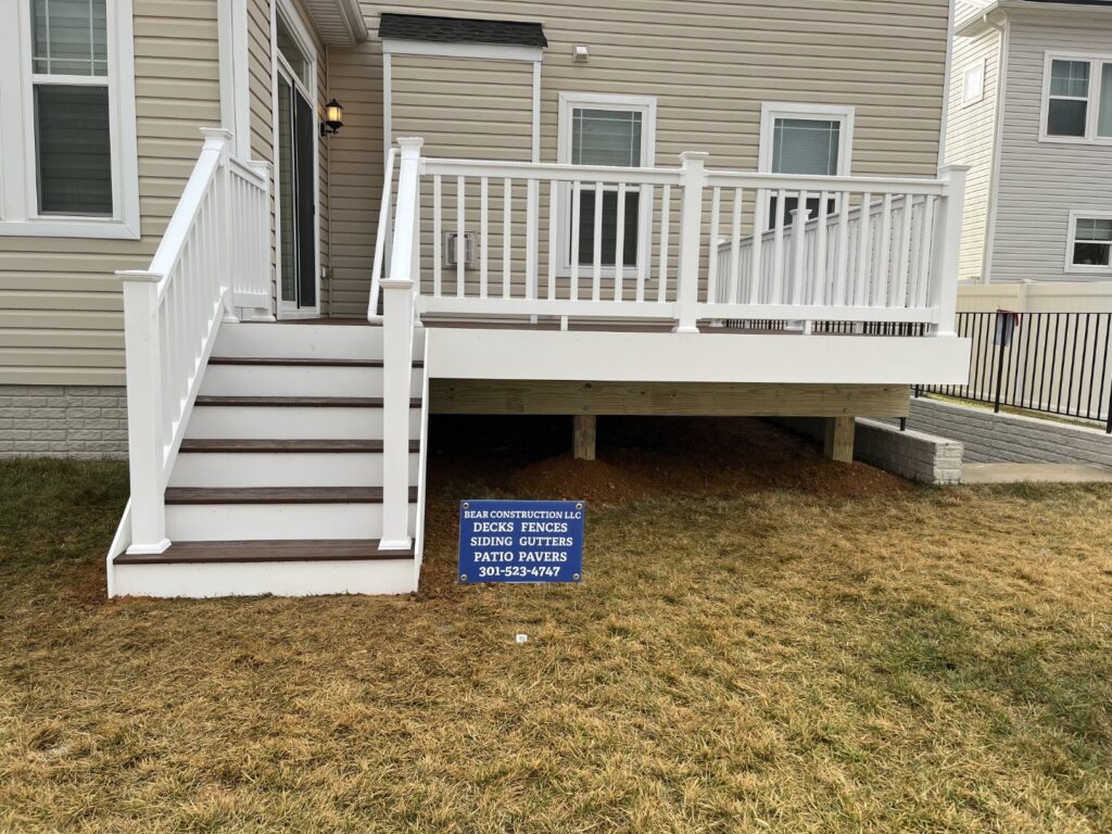 Deck stairs with a Bear Construction sign